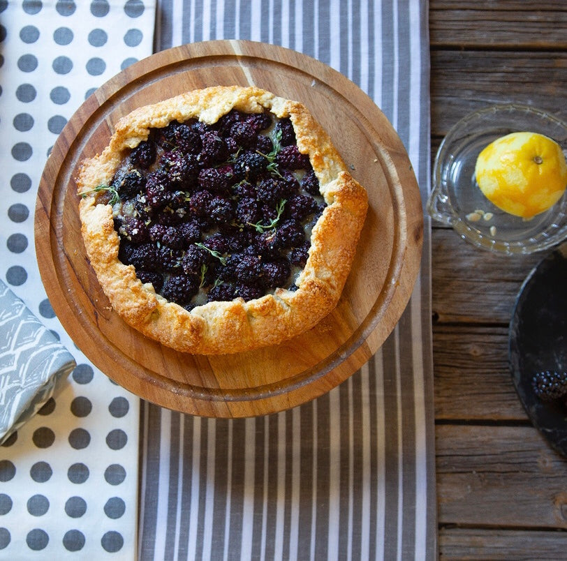 Blackberry and thyme tart recipe with grey striped and spotty tablecloths and wave fabric ships from Canada