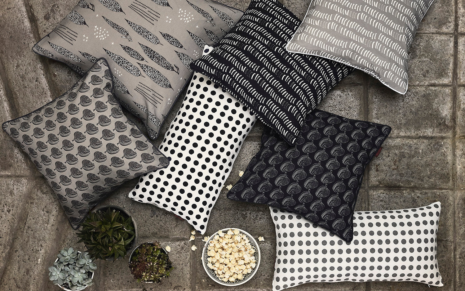 Black and grey designer decorative throw pillows ships from Canada worldwide including the USA