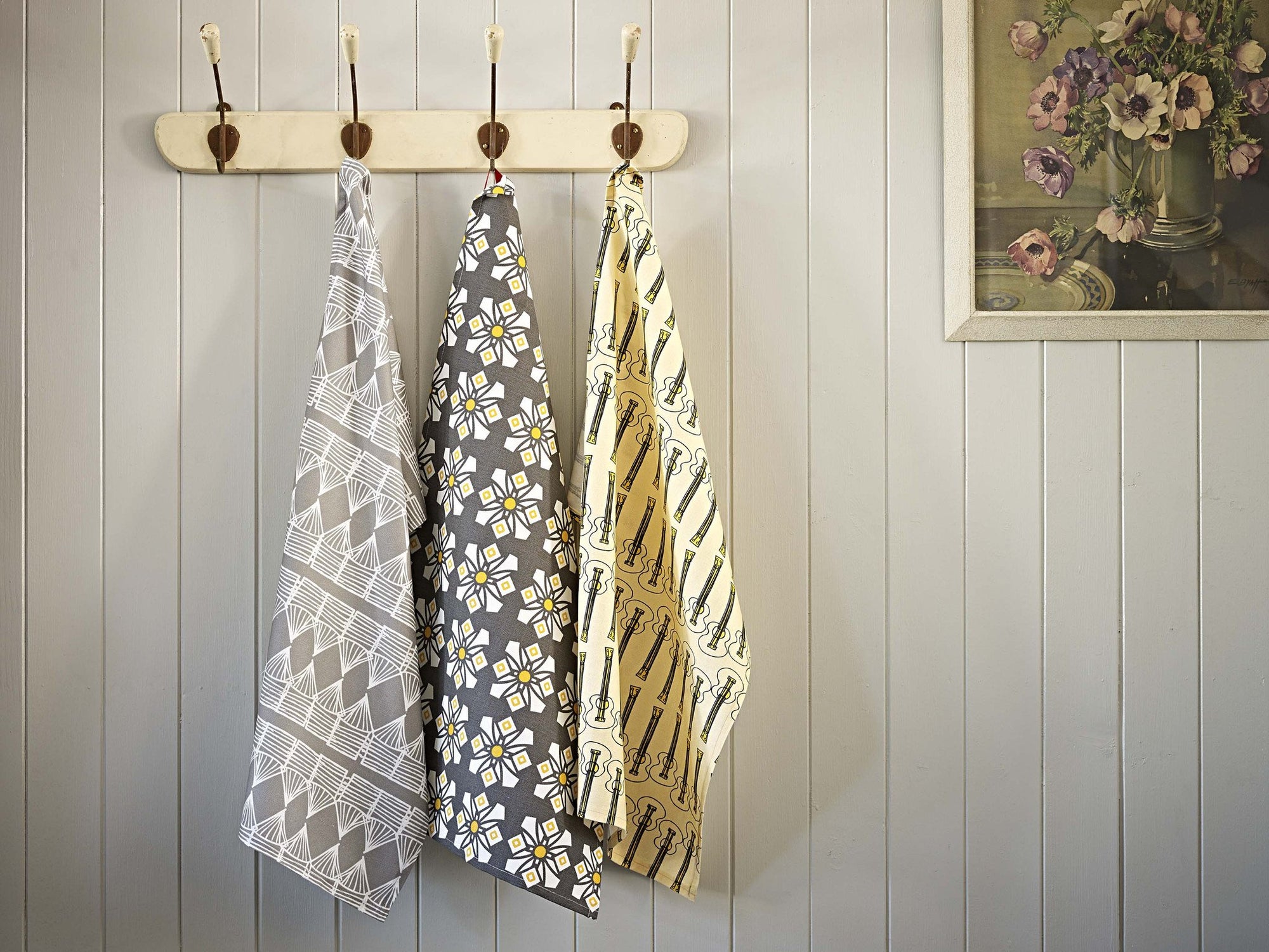 Kitchen tea towels in bright modern prints and stripes in shades of yellow from gold to straw in absorbent cotton linen ships from Canada worldwide including the USA